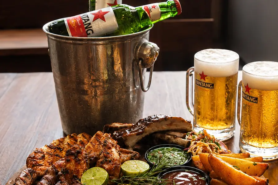 The Garden BBQ Platter with ribs, chicken, prawns, corn and two Bintang