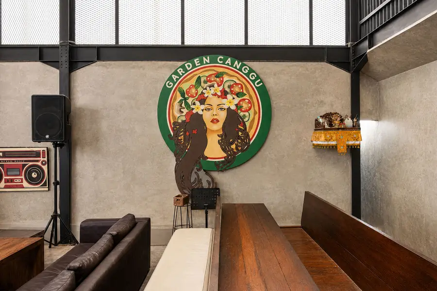 The Garden Canggu brand mural on the interior wall