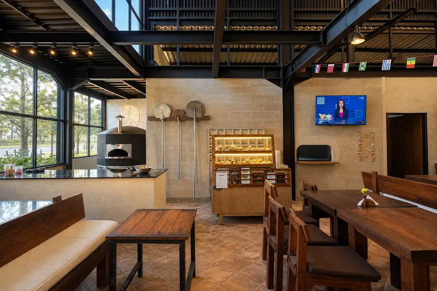 The lava stone pizza oven and dining corner at Garden Canggu