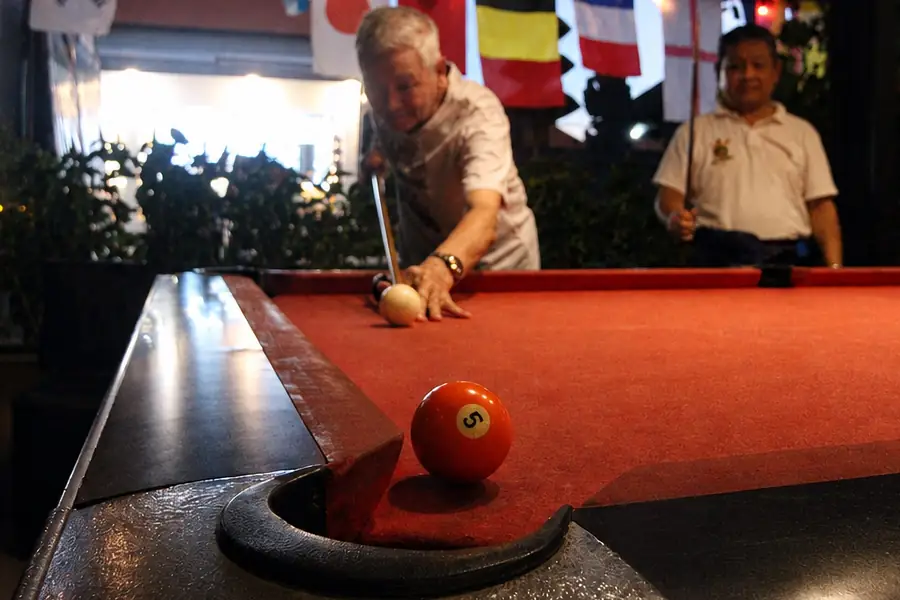 A game on the pool table at Garden Canggu
